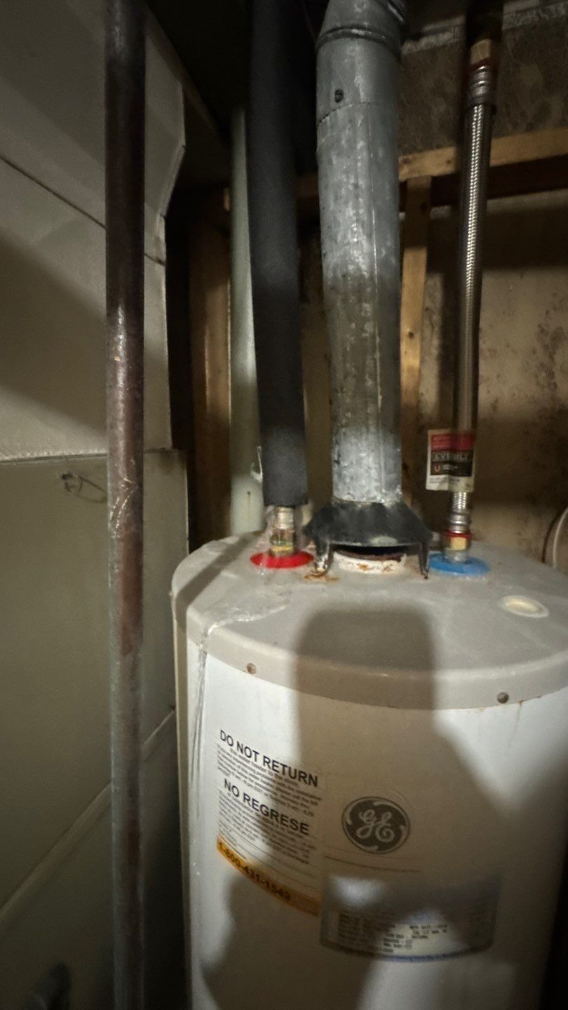 Water heater at the source of the basement leak