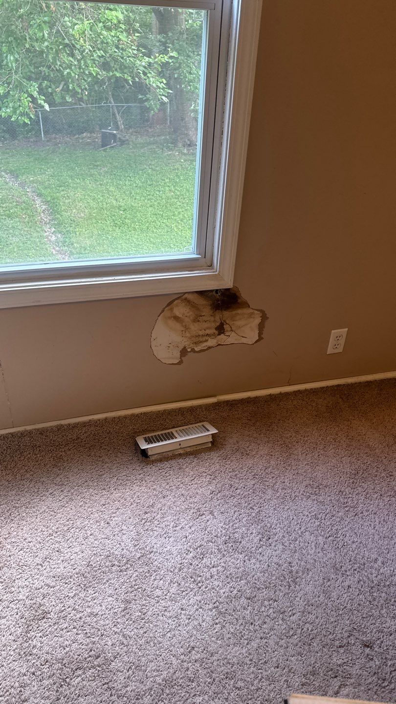 Water-soaked carpet in the affected bedroom